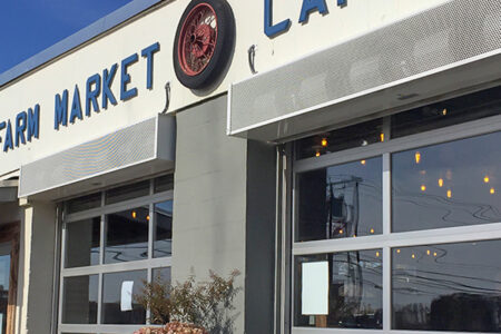 Berner's Industrial Direct Drive 12 air curtain over farm market garage doors.