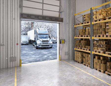Berner Industrial Direct Drive 14 air curtain over warehouse receiving door.