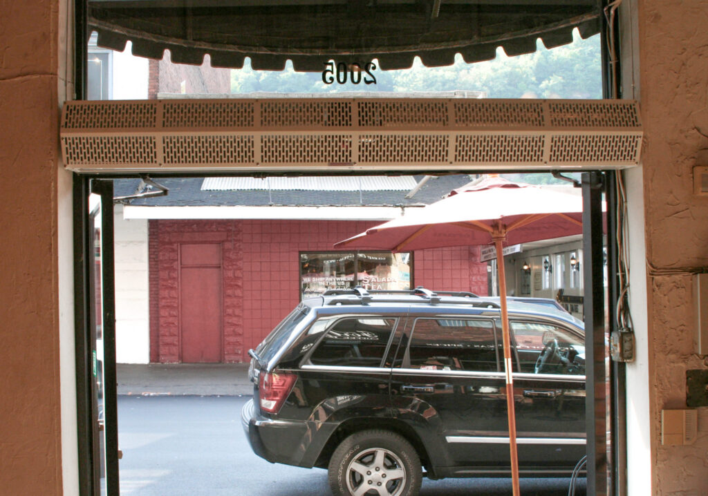Berner's Commercial Low Profile 8 air curtain over coffee shot entrance.