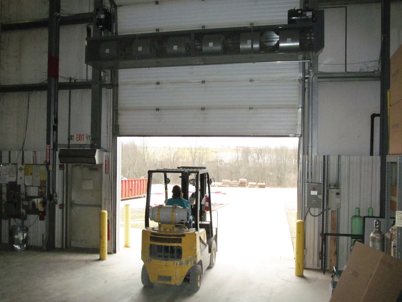 Berner's Industrial air curtain with forklift.