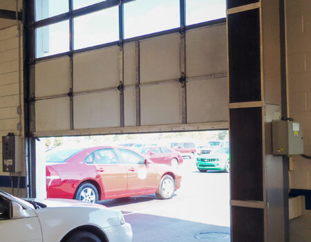 Berner's Industrial Direct Drive 12 and 14 Air Curtain vertically mounted garage door