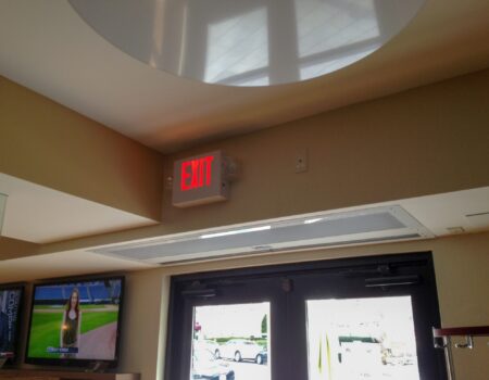 Berner's Architectural Recessed 12 air curtain over restaurant entrance.