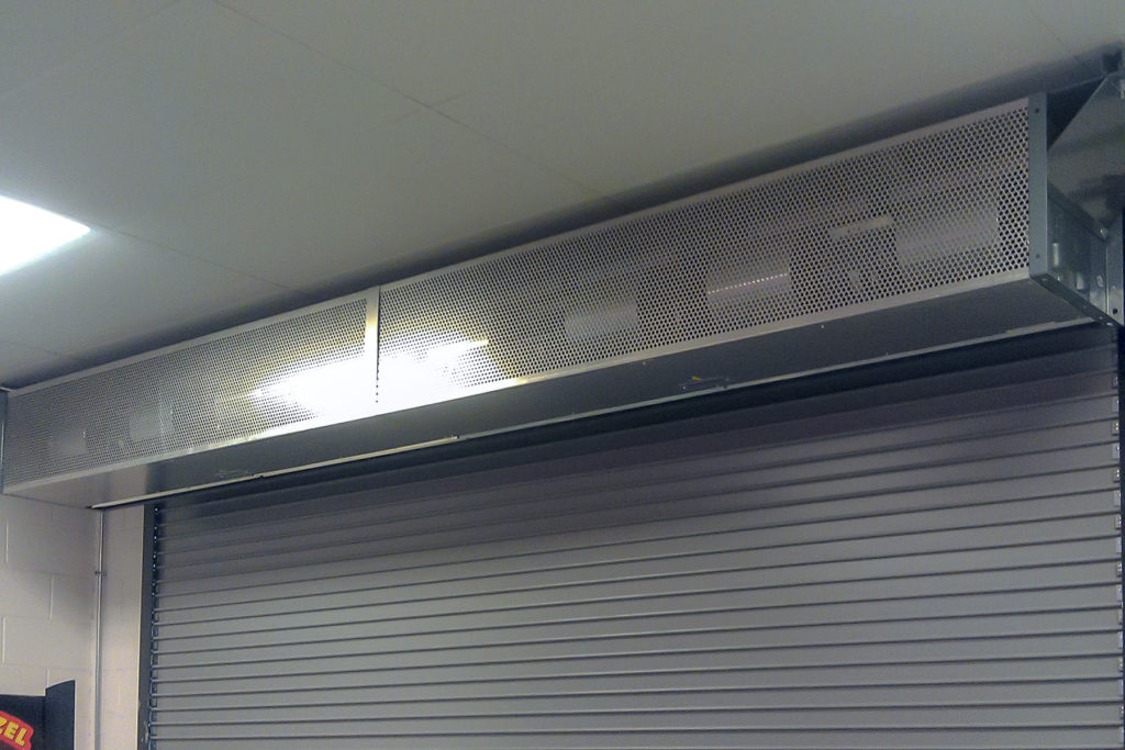 Berner's Industrial Direct Drive 12 and 14 Air Curtains over inside of service window