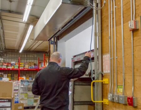 Berner's Industrial Direct Drive 12 and 14 Air Curtain over grocery store shipping/receiving dock door