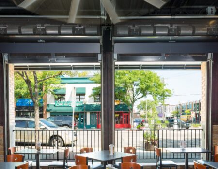 Berner's Industrial Direct Drive 12 and 14 Air Curtains over restaurant wall opening