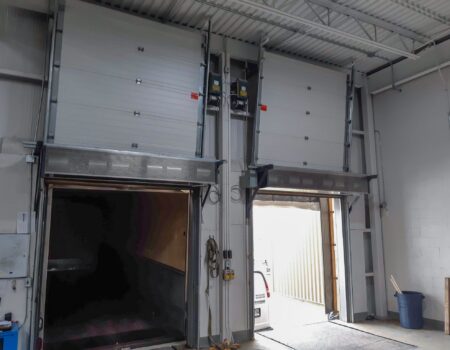 Berner's Industrial Direct Drive 12 and 14 Air Curtains over loading dock doors