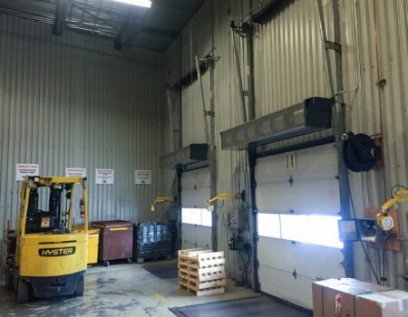 Berner's Industrial Direct Drive 12 and 14 Air Curtains over loading dock doors