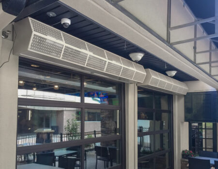 Berner Commercial High Performance 10 Air Curtain over restaurant patio entrance.