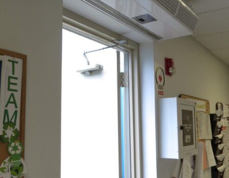 Berner's Commercial Low Profile 8 Air Curtain over employee entrance.