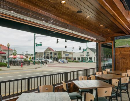 Berner's Commercial Low Profile 8 Custom Air Curtain over wall of doors at pub