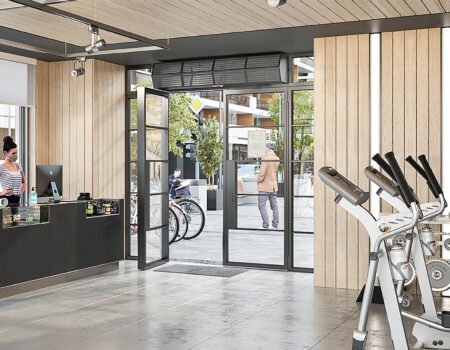 Berner Commercial High Performance 10 air curtain over gym entrance.