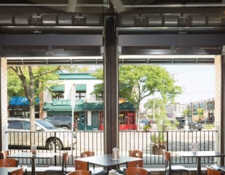 Berner Industrial Direct Drive 12-14 Air Curtain over garage door wall at ToRaLoo Pub.