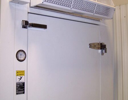 Berner Sanitation Certified Low Profile 7 Air Curtain over walk-in cooler door.