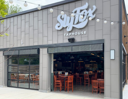 Berner's Industrial Direct Drive 12 air curtain protecting open air dining.