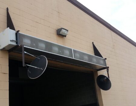 Berner's Industrial Direct Drive 12-14 Air Curtain on outside garage style door.