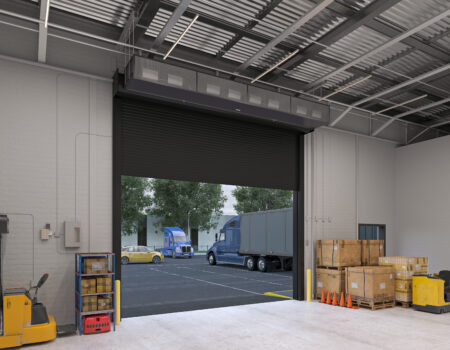 Berner's Industrial Direct Drive 20 air curtain over box warehouse dock door.