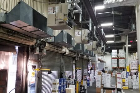 5 Berner Industrial Direct Drive Air Curtains over shipping receiving doors at Royal Wine