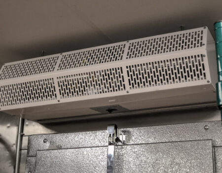 Berner's Commercial Low Profile 8 air curtain close-up on walk-in cooler.