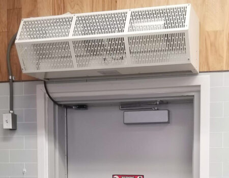 Berner Sanitation Certified High Performance 7 air curtain over employee entrance.