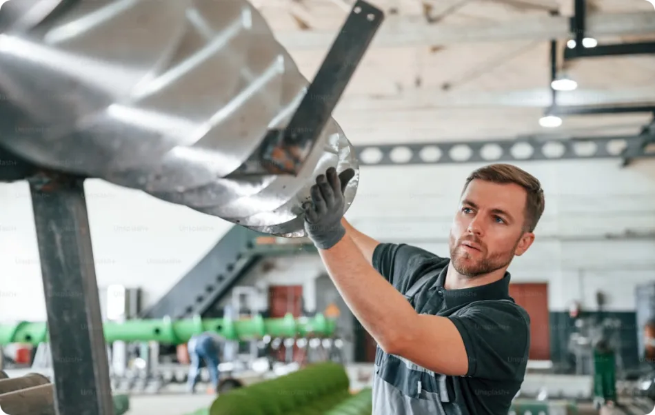 History of Air Curtains Man Installing Air Curtain